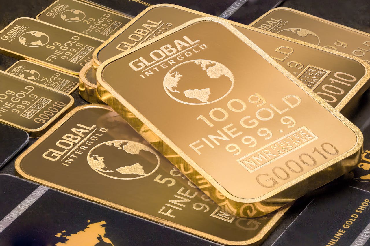 The Art of Drawing Readers In: Your attractive post title goes here A detailed shot of gold bars labeled 'Global Intergold' as a symbol of wealth and investment.